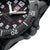Luminox klocka sidovy med krona, knappar och svart boett
