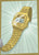 Guld färgad Casio Vintage-klocka med metallarmband och digital display i profil
