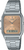 Casio Vintage armbandsur med silverfärgat rostfritt stålband, beige urtavla och digital display nedtill.