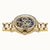 Goldfarbene Herrenarmbanduhr von der Seite mit offenem Automaten-Zifferblatt
