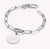 Armband i silver med Connect-länk, karbinhake och rund gravyrplatta