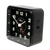 Svart radiostyrd väckarklocka snett framifrån, analog display med siffror