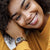 "Damklocka på handleden med blå urtavla och guldfärgade länkar"