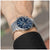 Męski zegarek Festina Chronograph na nadgarstku z niebieską tarczą i bransoletą ze stali szlachetnej
