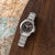 Festina Herrenuhr mit silbernem Edelstahlband und schwarzem Zifferblatt