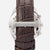 "Seiko herrklocka med brunt läderarmband och spänne, närbild med SEIKO-logotyp"