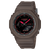 Casio G-Shock Herrenuhr mit schwarzem Zifferblatt, roter Akzentring und braunem Armband