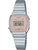 "Damklocka med silverfärgat metallarmband och rektangulär digital display med rosa ram"
