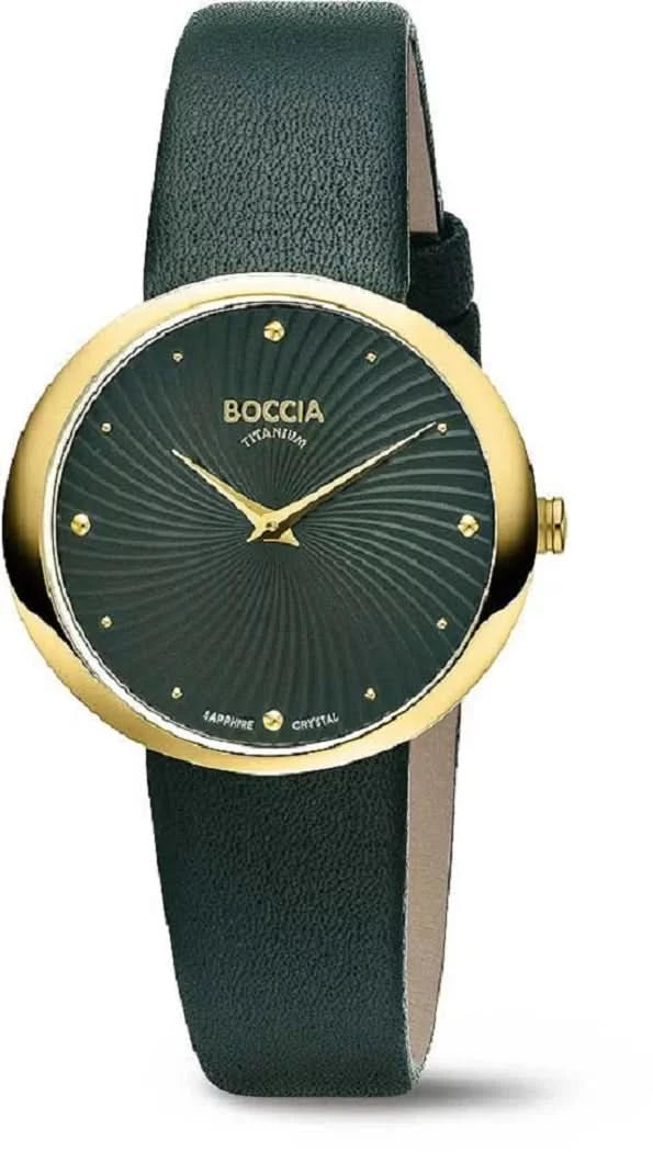 Boccia damklocka med grönt läderarmband, runt guldfärgat urverk och mörk urtavla