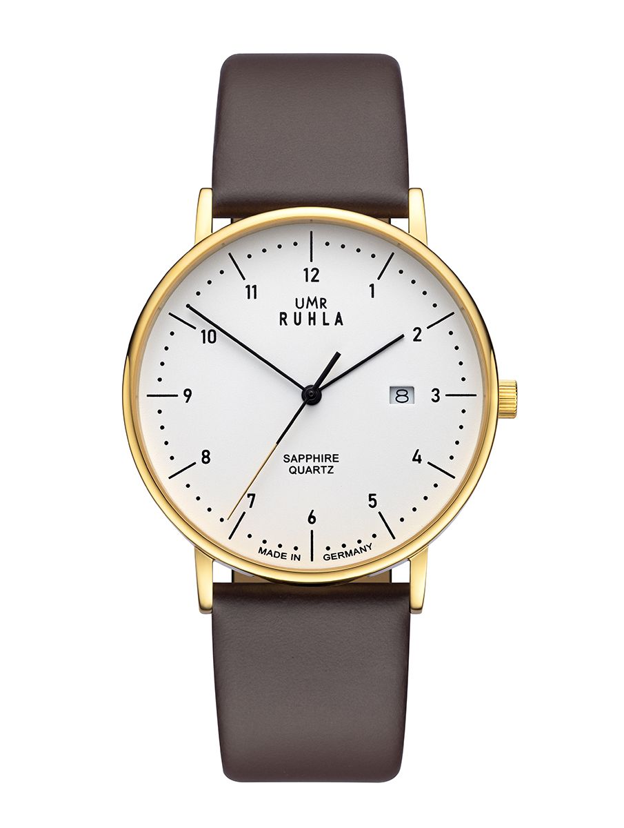Armbandsur med guldfärgat boett, brunt läderarmband och vit urtavla, safirglas och kvartsurverk.