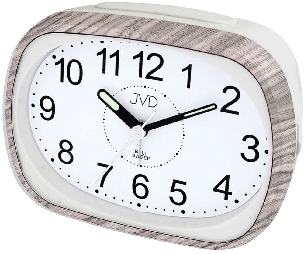 Klassisk analog väckarklocka med vit urtavla, svarta visare och JVD-logotyp
