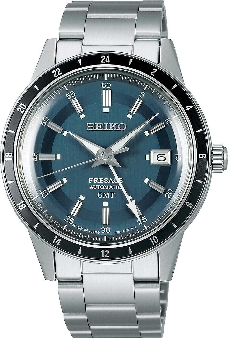 "Seiko Presage herrklocka med blå urtavla och metallarmband, datumfönster"