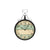 Wanduhr mit rundem schwarzem Metallrahmen und Vintage-Zifferblatt in Beige und Grün
