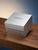 Zeppelin-Uhrbox aus Karton mit Logo, Deckel geschlossen