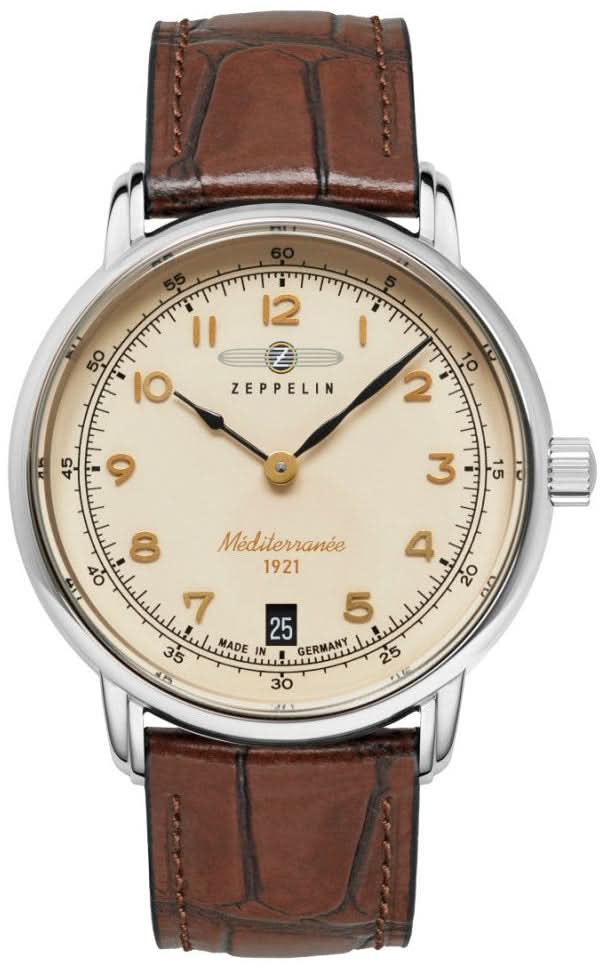 Herrarmbandsur med runt silverfärgat hölje, beige urtavla och brunt läderarmband