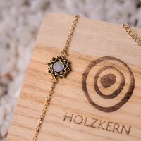 Composition armband med vitt pärlemorhänge - Holzkern Modell: Jewelry