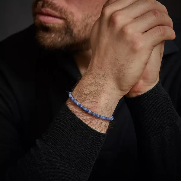 Armband av skivformade ädelstenar i blå toner med rostfritt stållås - Rebel&Rose Modell: RR-40080-S-M