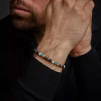 Armband av 6 mm ädelstenar (agat, larvikit,...