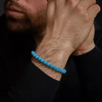 Armband med 8mm stora Turqurenit-stenar med rostfritt...