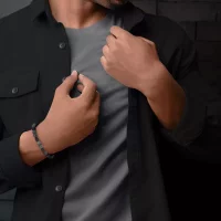 Armband av 8 mm stora grå ädelstenar med...